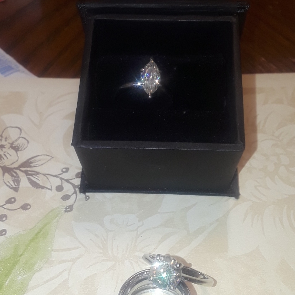 Real diamond total of 4.20 carats for both ring.